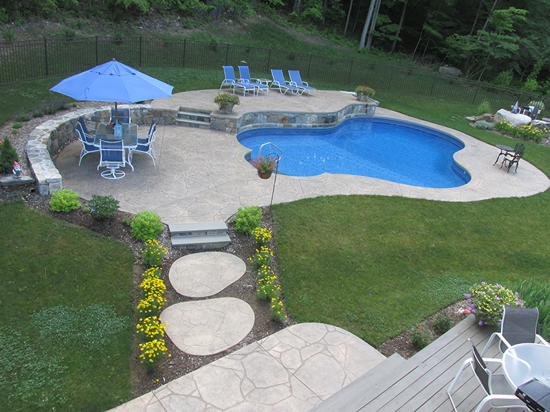 Swimming pool and stamped concrete project example 55